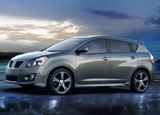 A three-quarter front view of a silver 2009 Pontiac Vibe AWD A three-quarter front view of a silver 2009 Pontiac Vibe AWD